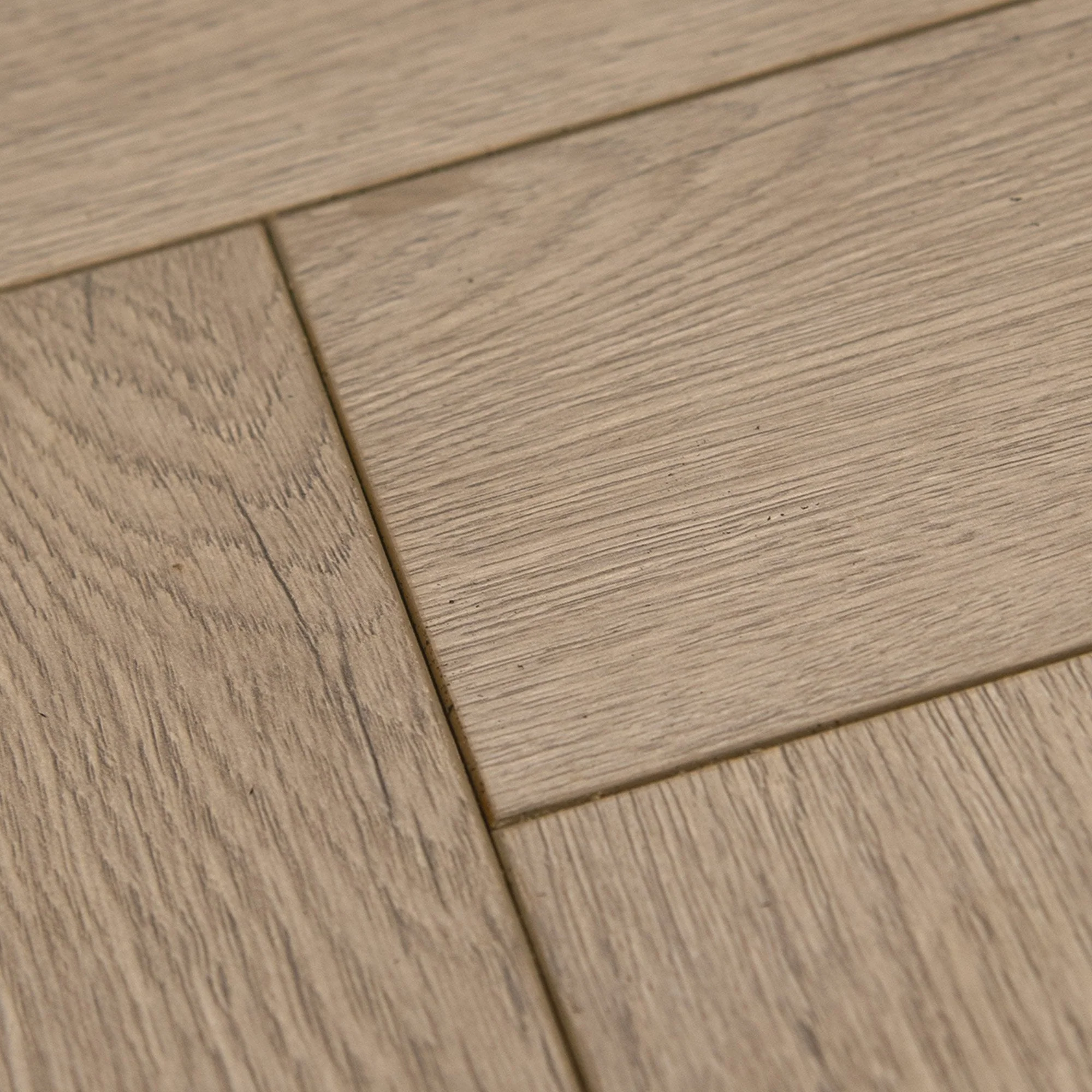 Silver Serenity Oak - Comfort Luxe 12mm Laminate Herringbone Flooring - Image 4